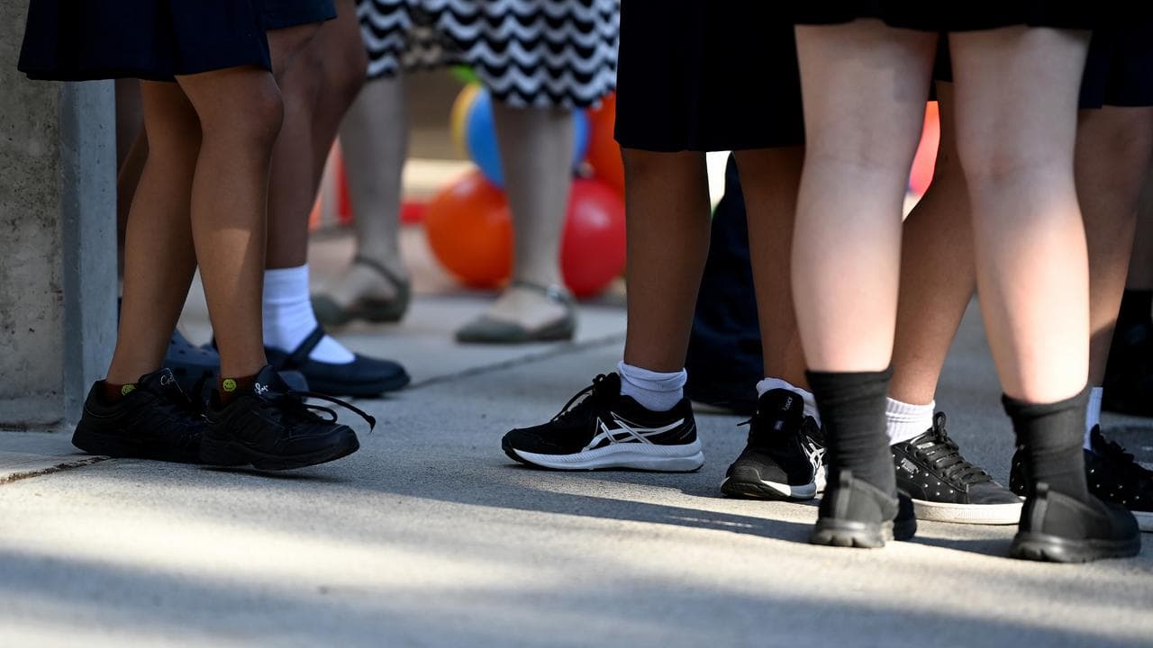 School students return back to school (file image)