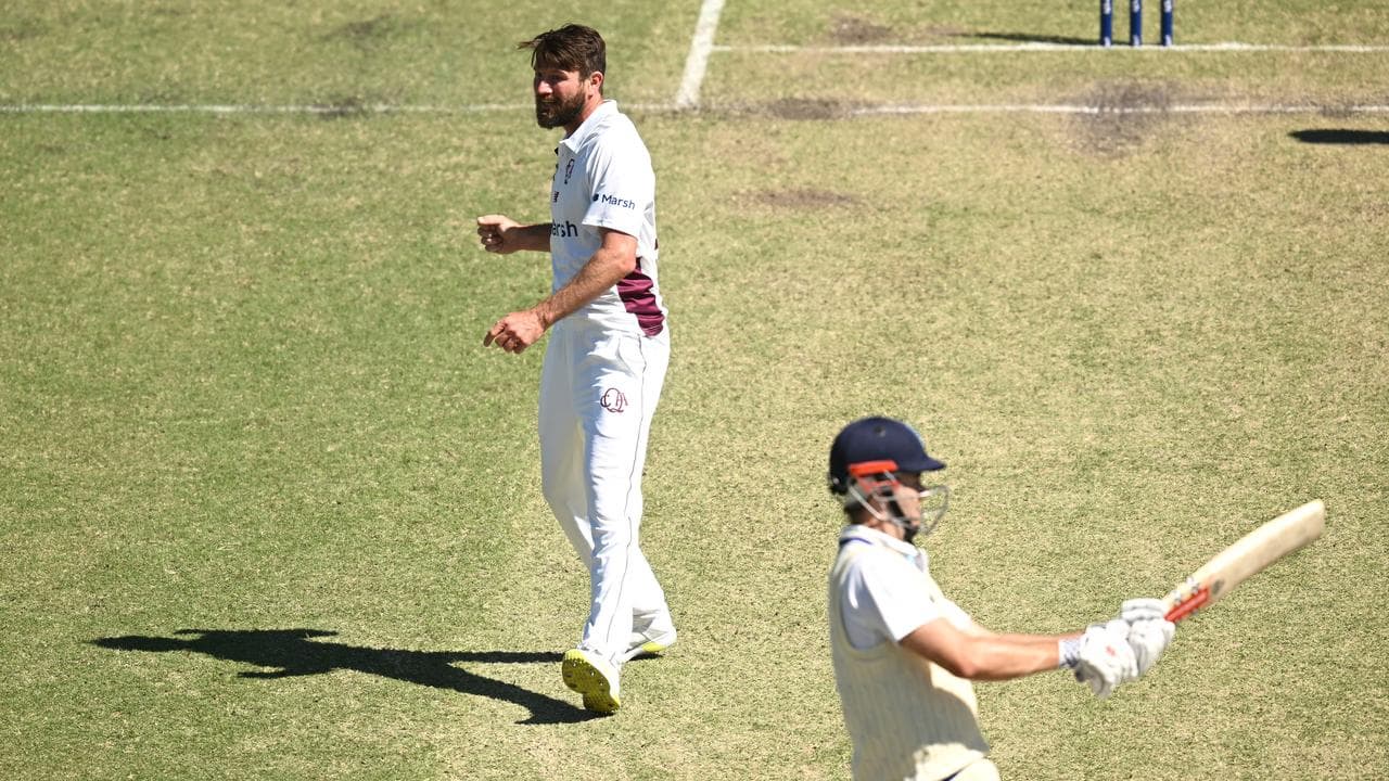 Michael Neser of the Bulls (left) removes NSW player Kurtis Patterson.