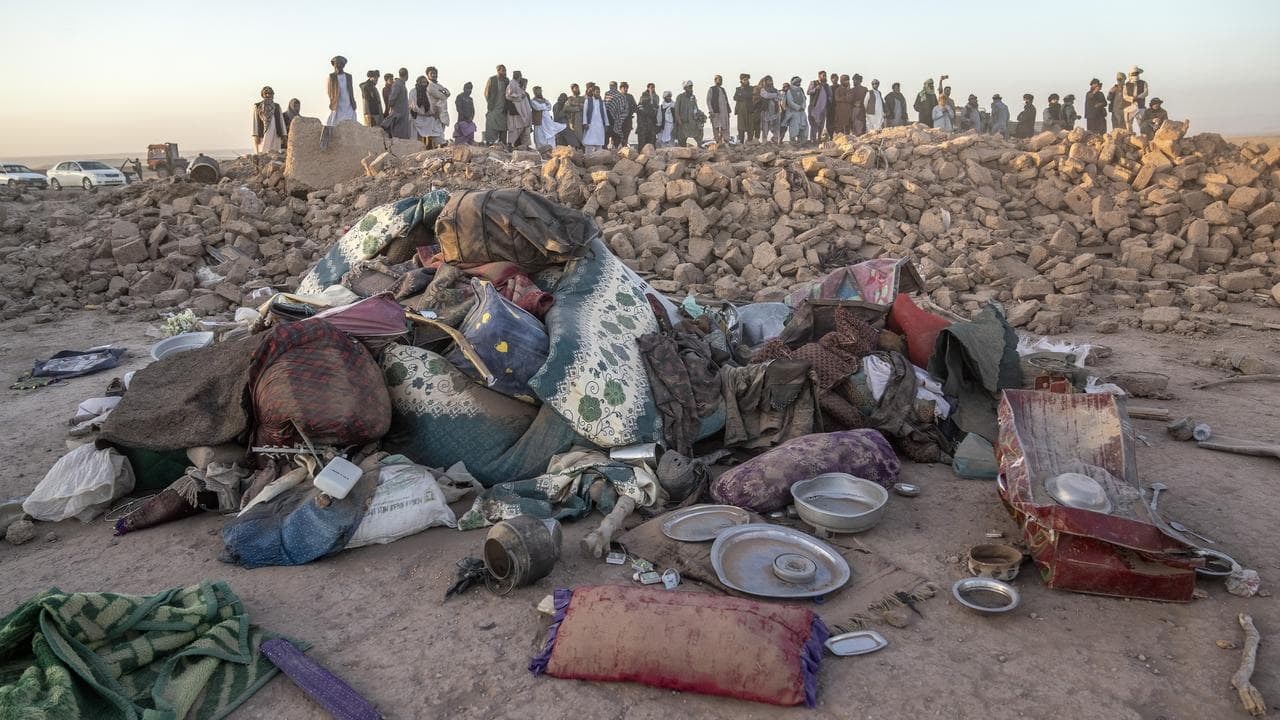 Afghan men search for victims in Herat province
