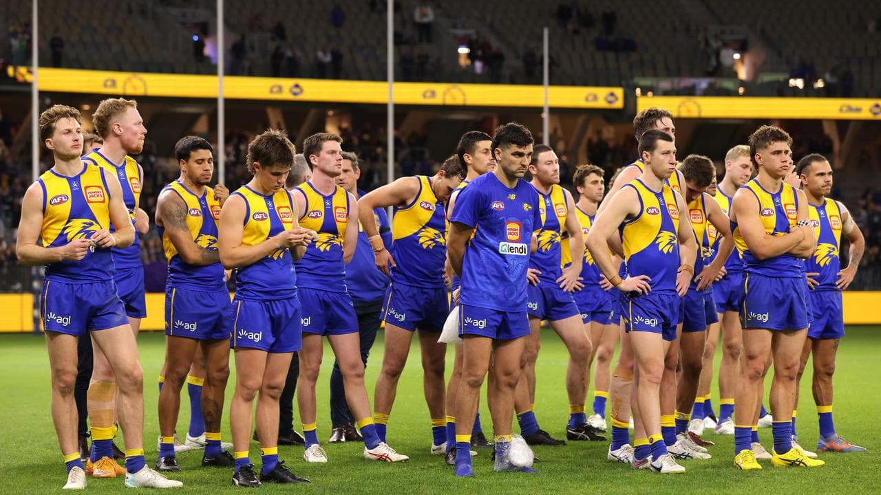 West Coast players dejected.