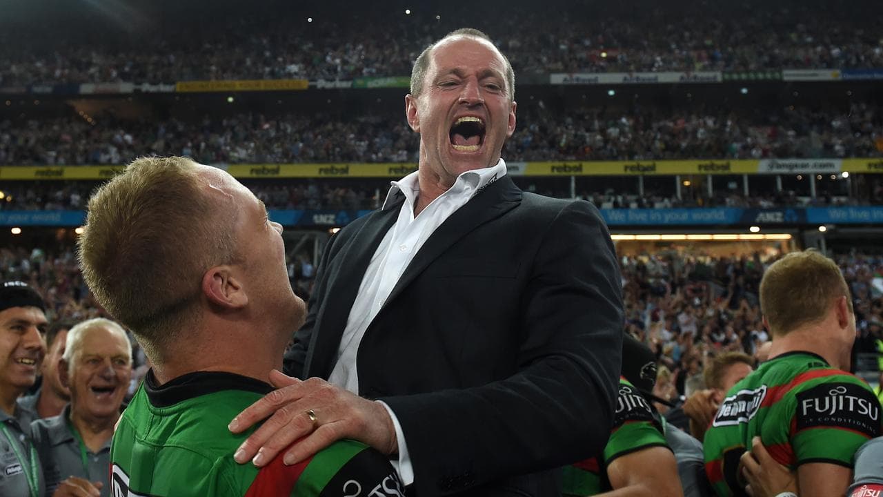 Michael Maguire celebrates South Sydney's 2014 premiership.