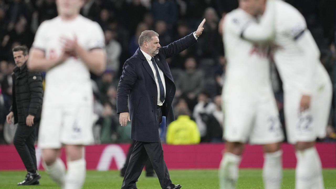 Tottenham manager Ange Postecoglou salutes the crowd.