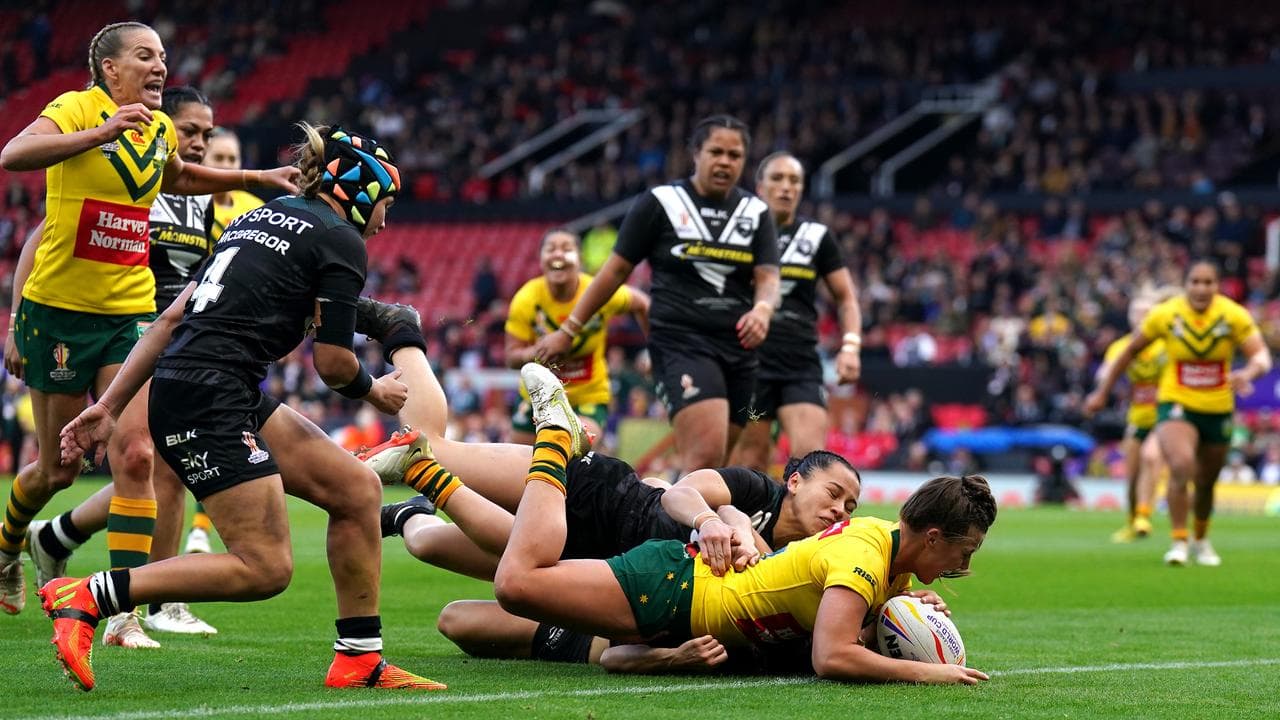 Australia's Jessica Sergis scores a try.