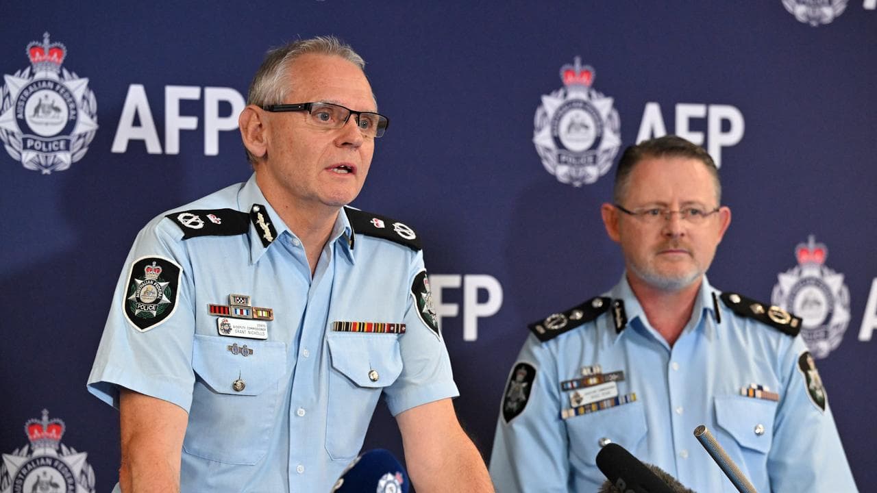 Acting deputy and assistant commissioners Grant Nicholls, Nigel Ryan.