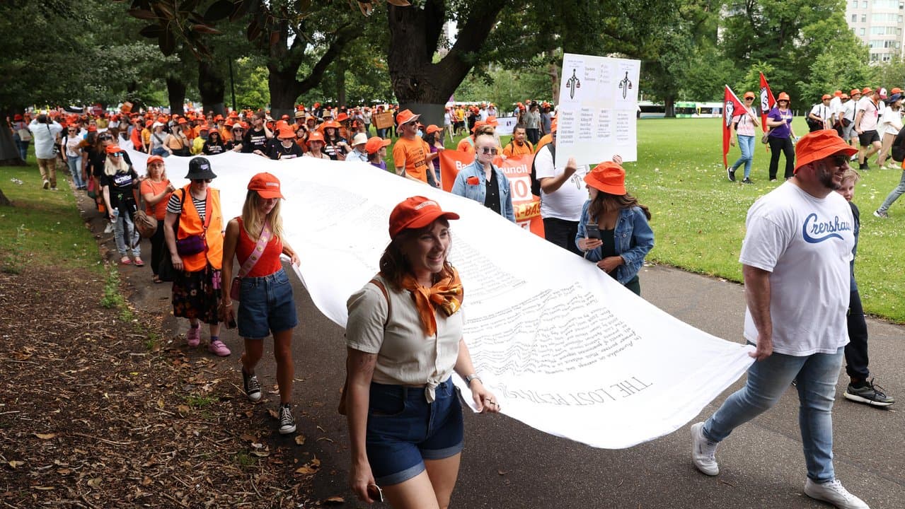 Supporters carrying the 'Lost Petition'.
