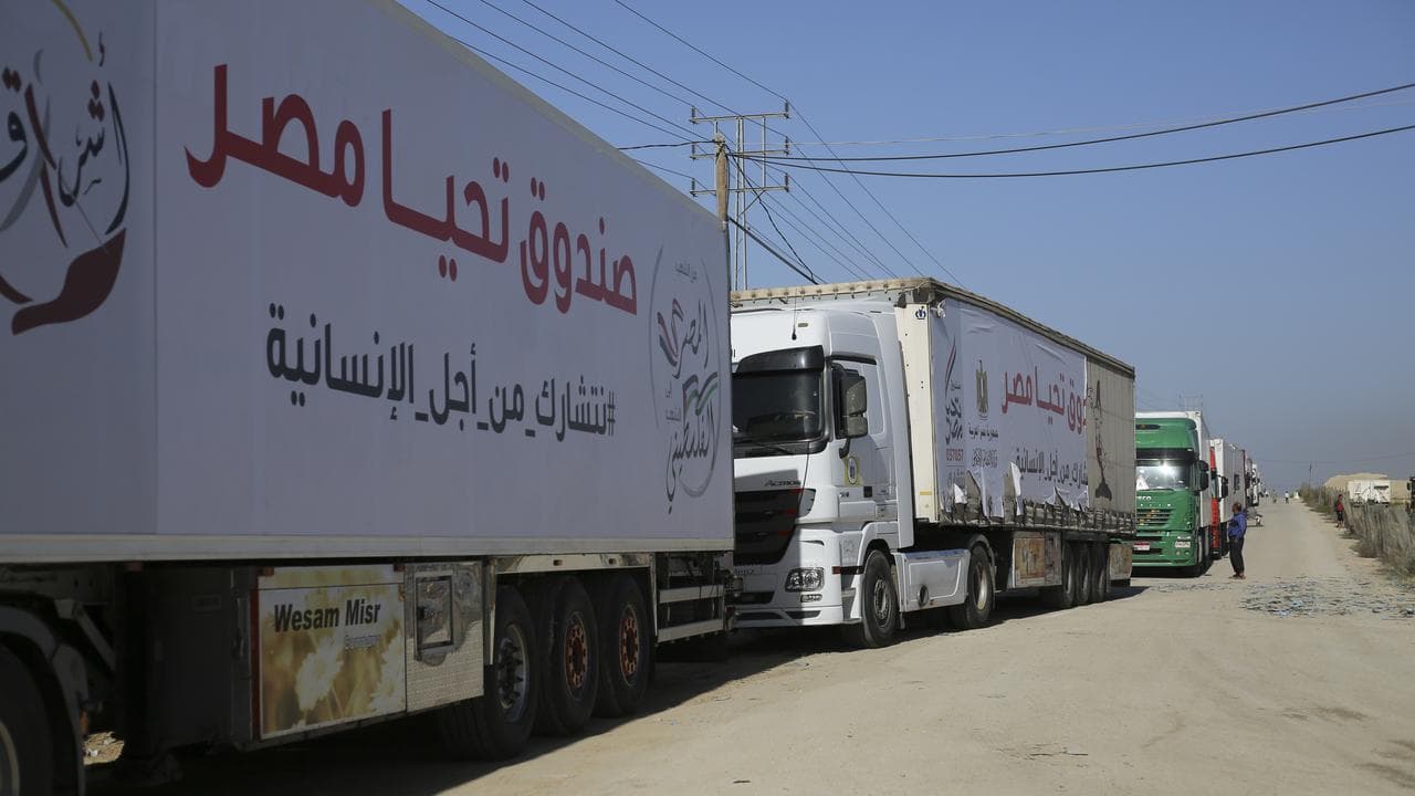 Trucks carrying humanitarian aid enter Gaza Strip from Egypt in Rafah