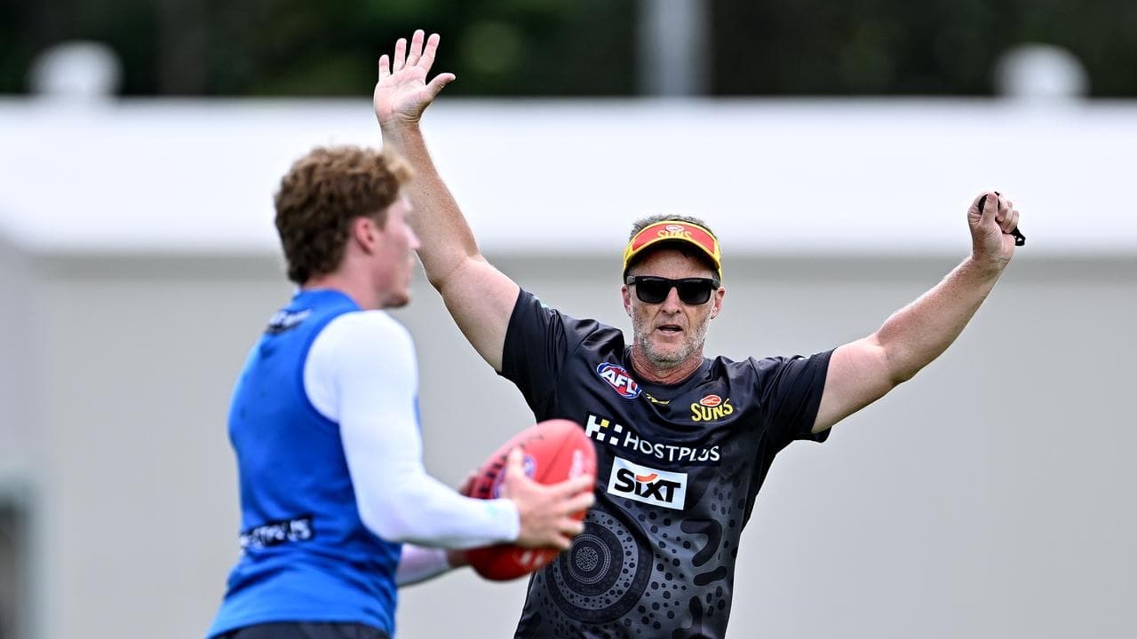 Damien Hardwick taking part in training with the Suns.