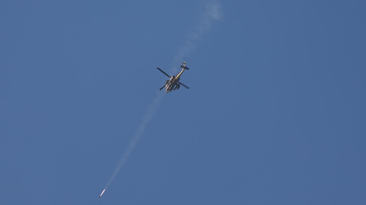 Israeli apache firing missile toward targets in the Gaza Strip