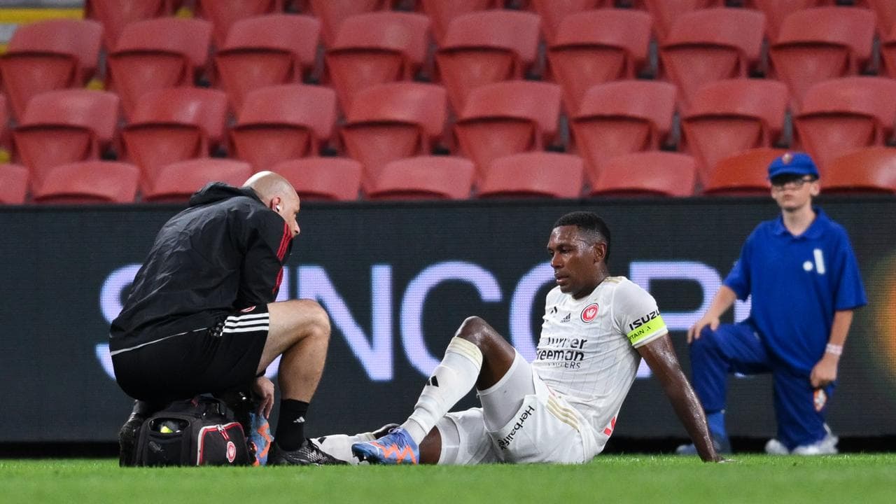 WSW skipper Marcelo receives medical attention against Brisbane. 