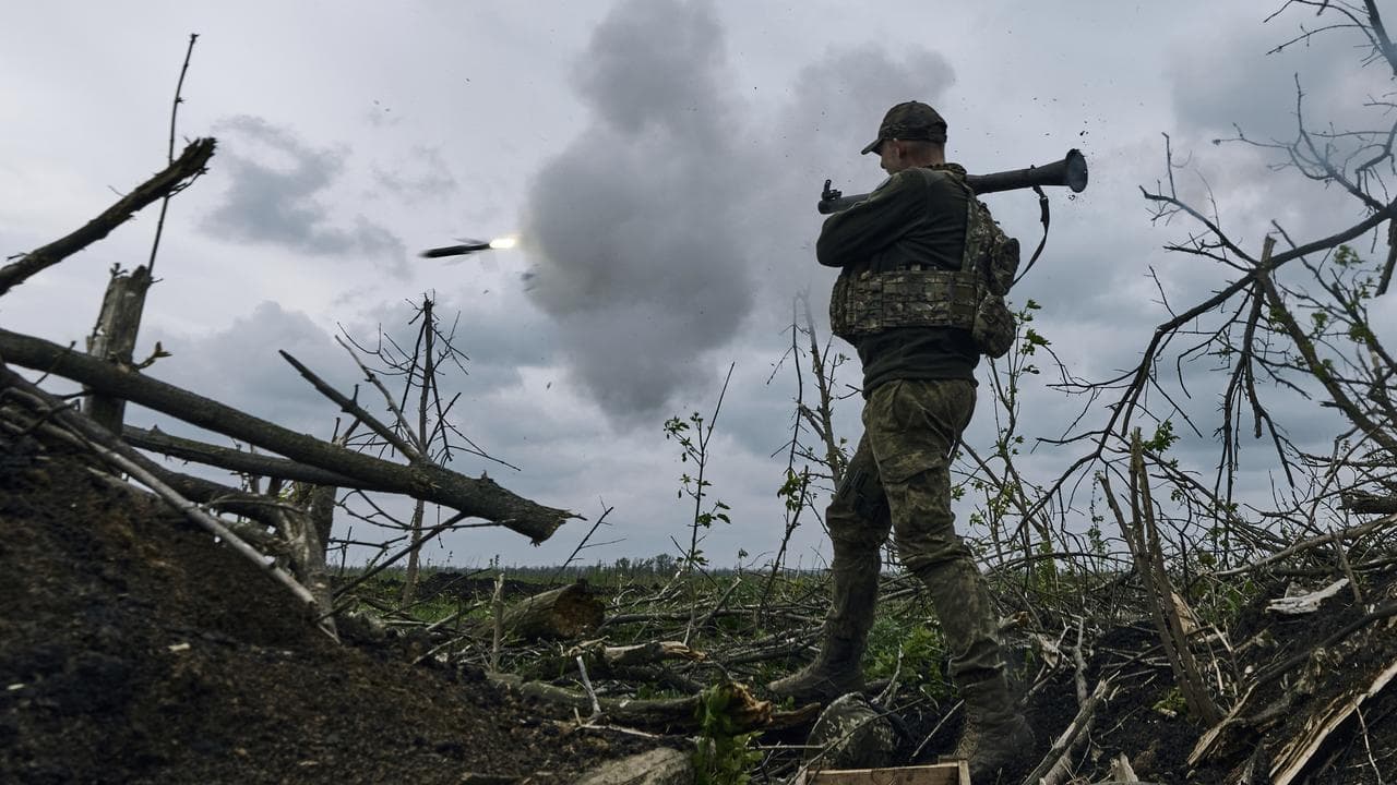 File photo of soldier firing RPG toward Russian positions in Avdiivka.