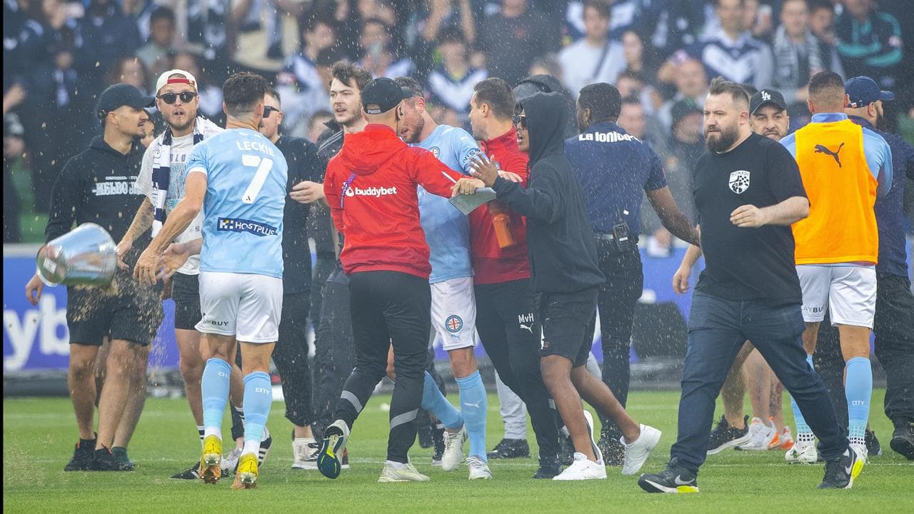 Melbourne Victory fans invade the pitch (file image)