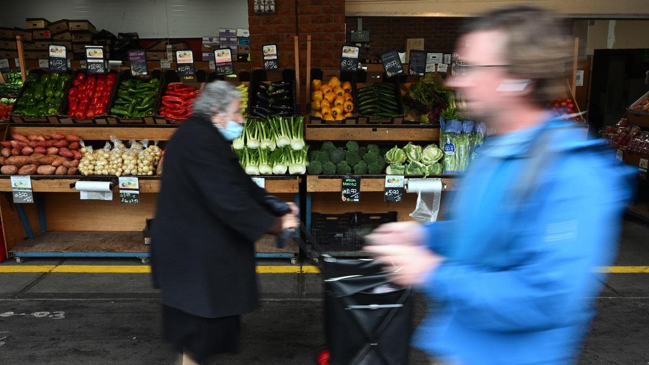 Members of the public shop for fresh produce.