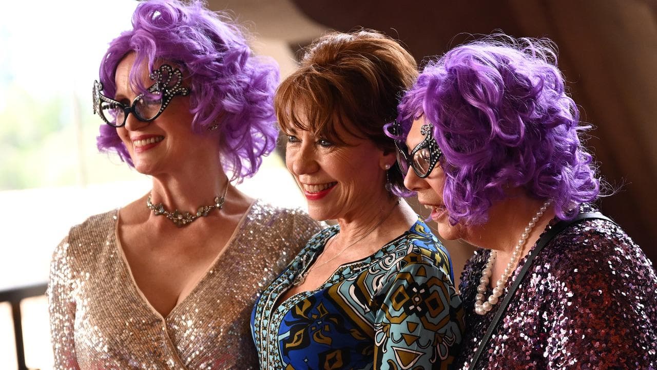 Kathy Lette and others at the memorial service for Barry Humphries.