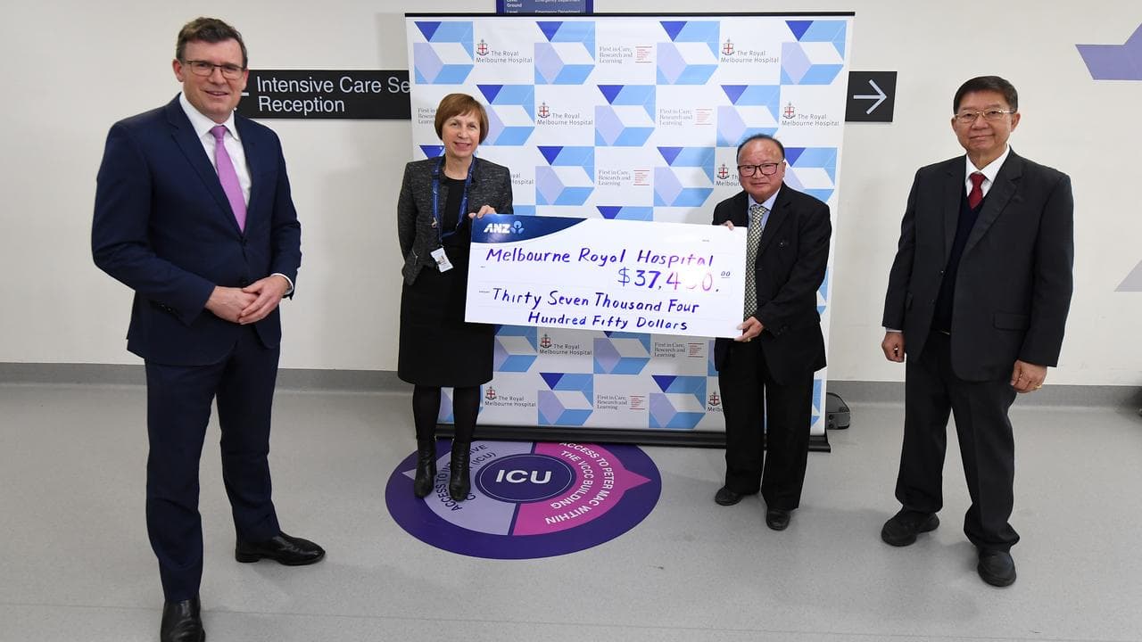 Alan Tudge (left) at the hospital cheque presentation (file image)