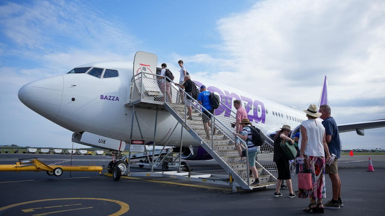 People board a Bonza flight.