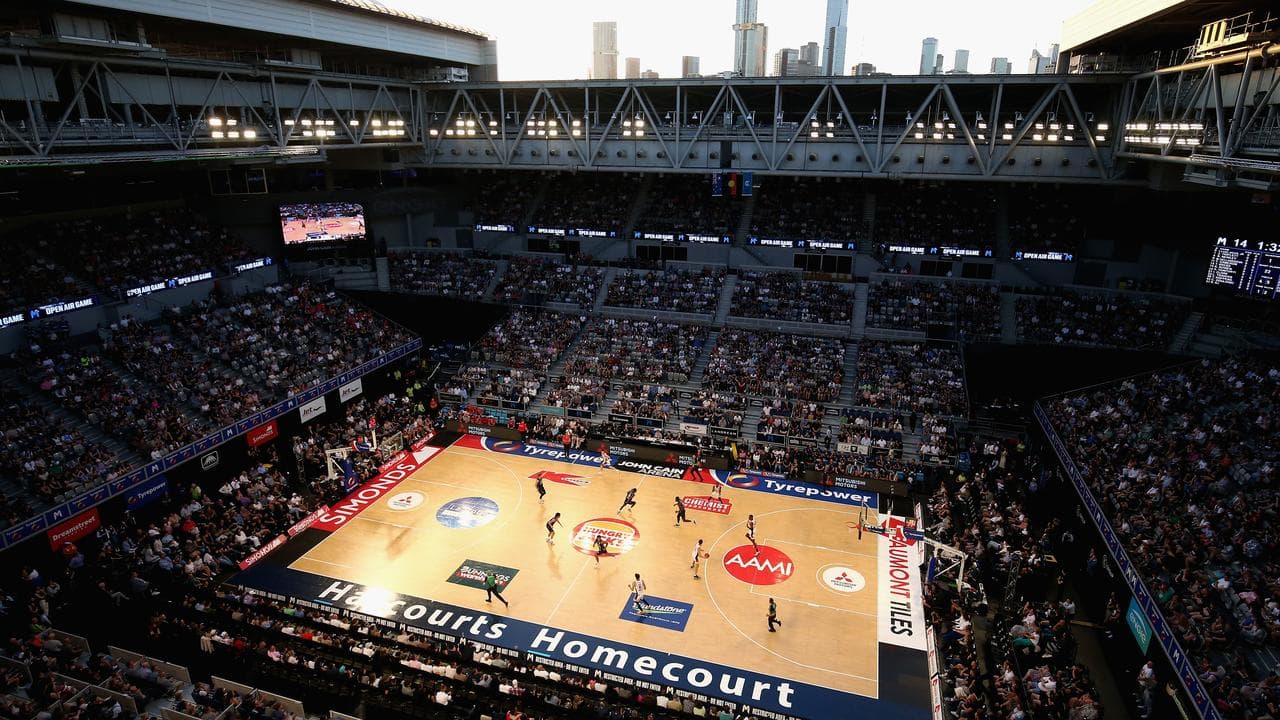 Melbourne skyline visible from the open roof of the John Cain Arena.
