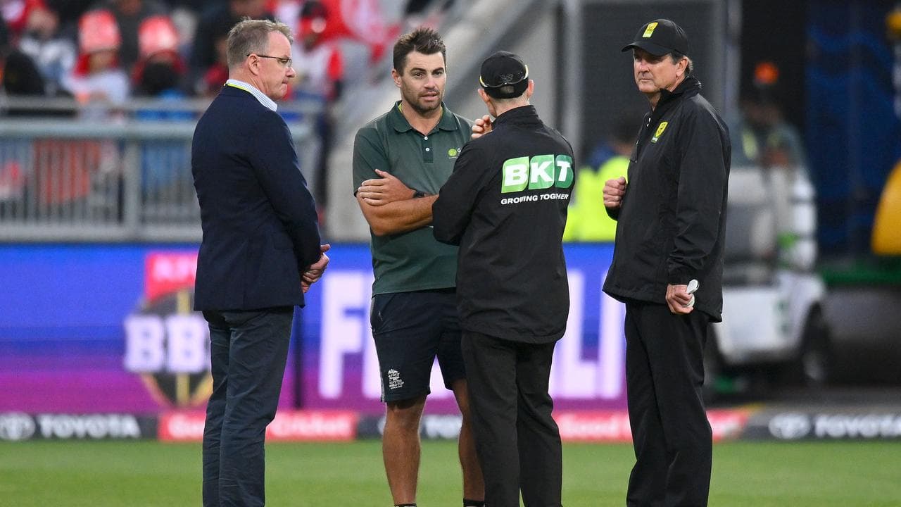 Match officials speak to ground staff at GMHBA Stadium