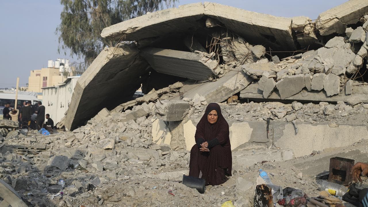 A Palestinian woman displaced by the Israeli bombardment of Gaza