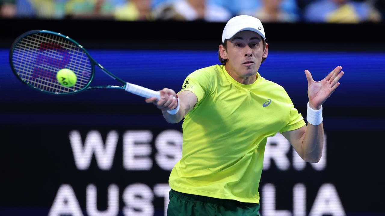 alex de Minaur in action against Novak Djokovic.