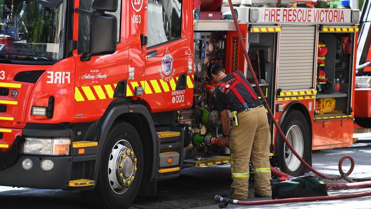 Metropolitan Fire Brigade truck and firefighter (file image)