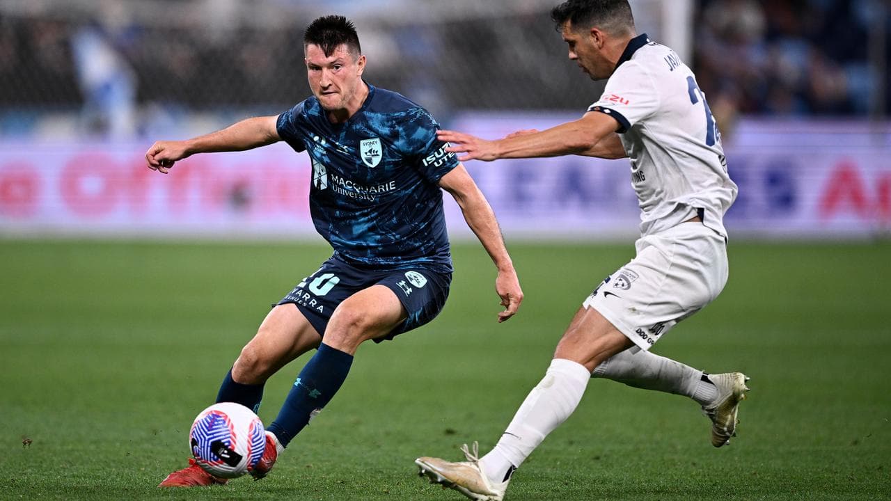 Sydney FC player Joe Lolley (left).