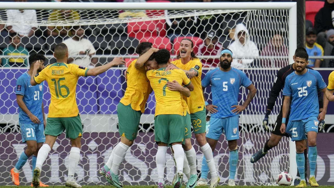Australia celebrate goal v India