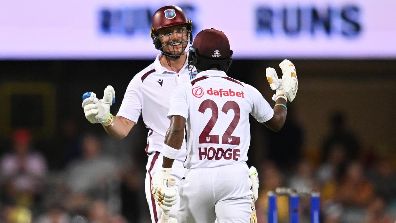 Joshua Da Silva with Kavem Hodge.