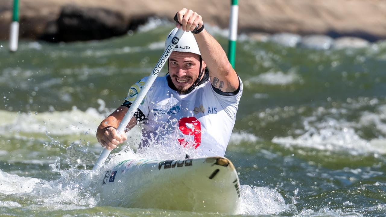 Tristan Carter paddles to gold in the C1 at the Australian Open. 