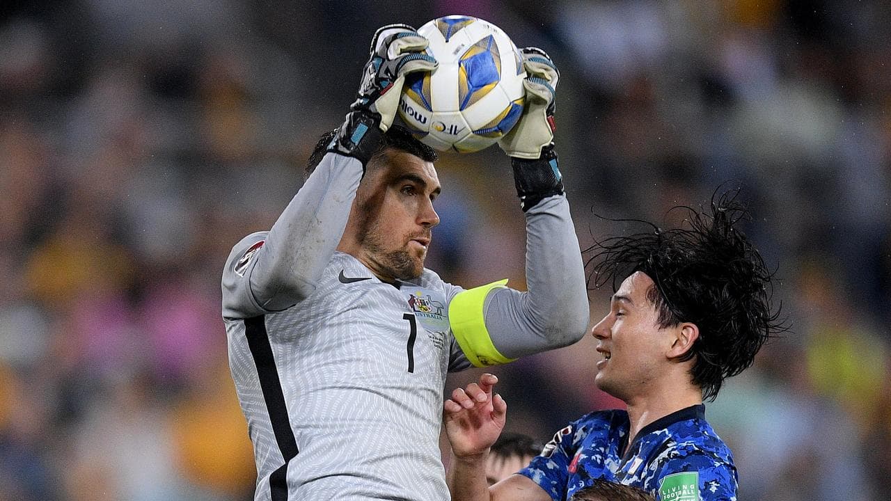 Mat Ryan makes a save for the Socceroos. 
