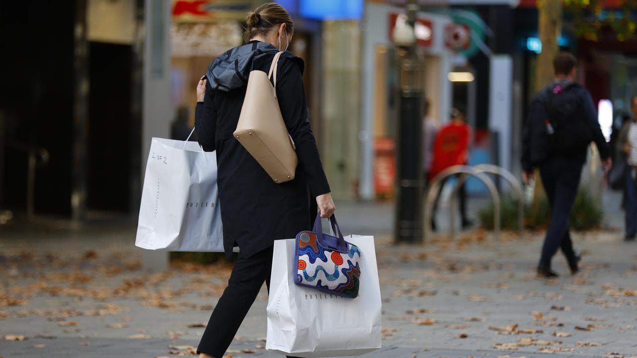 A woman in a shopping area.