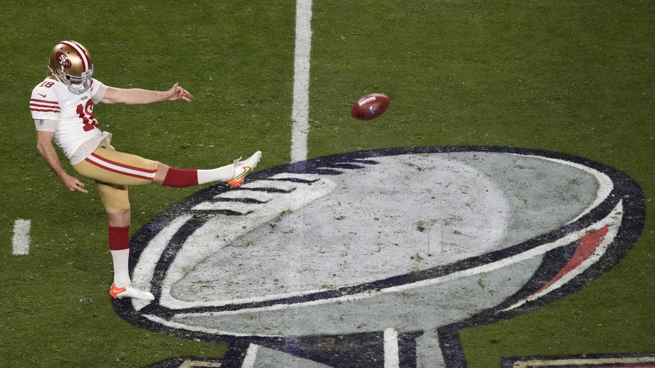 Mitch Wishnowsky punts against the Kansas City Chiefs.
