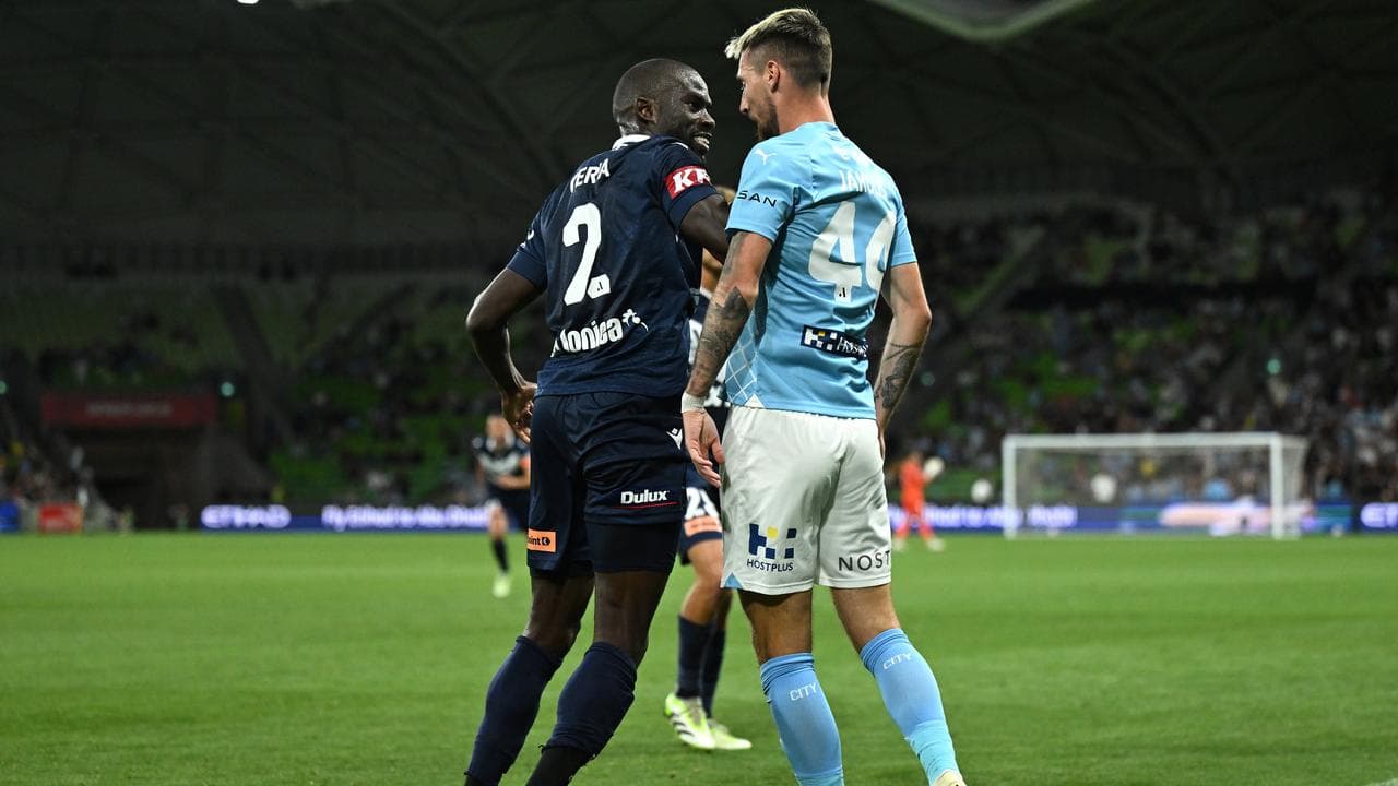 Jason Geria of Melbourne Victory and Marin Jakolis of Melbourne City