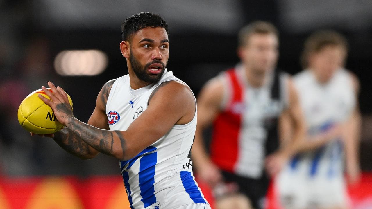 Tarryn Thomas playing for North Melbourne.