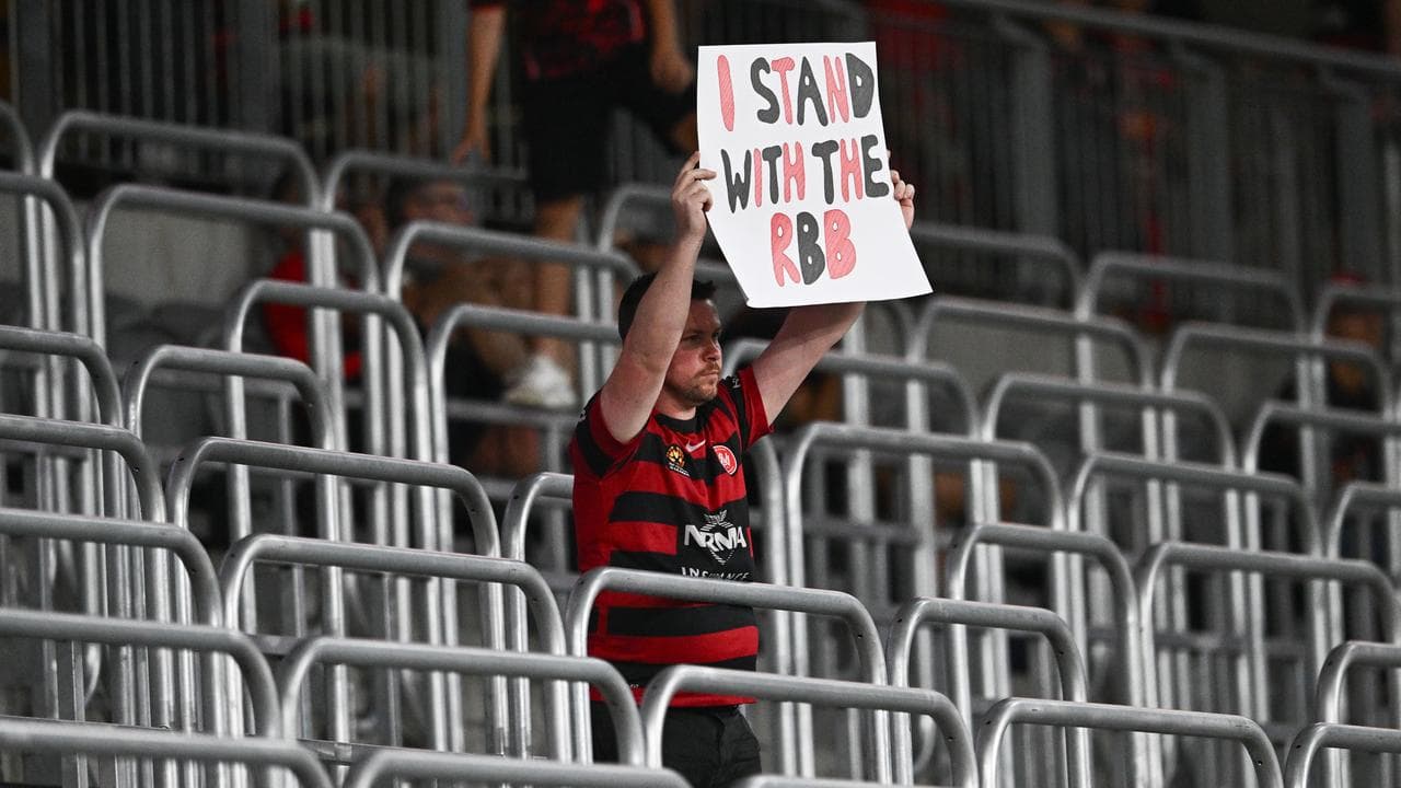 A Wanderers fan with a sign.