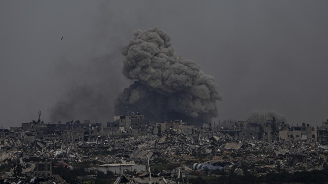 Smoke and explosions rise inside the Gaza Strip