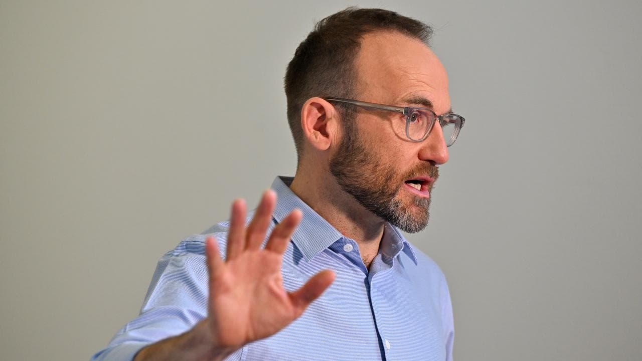 Greens leader Adam Bandt speaks to journalists