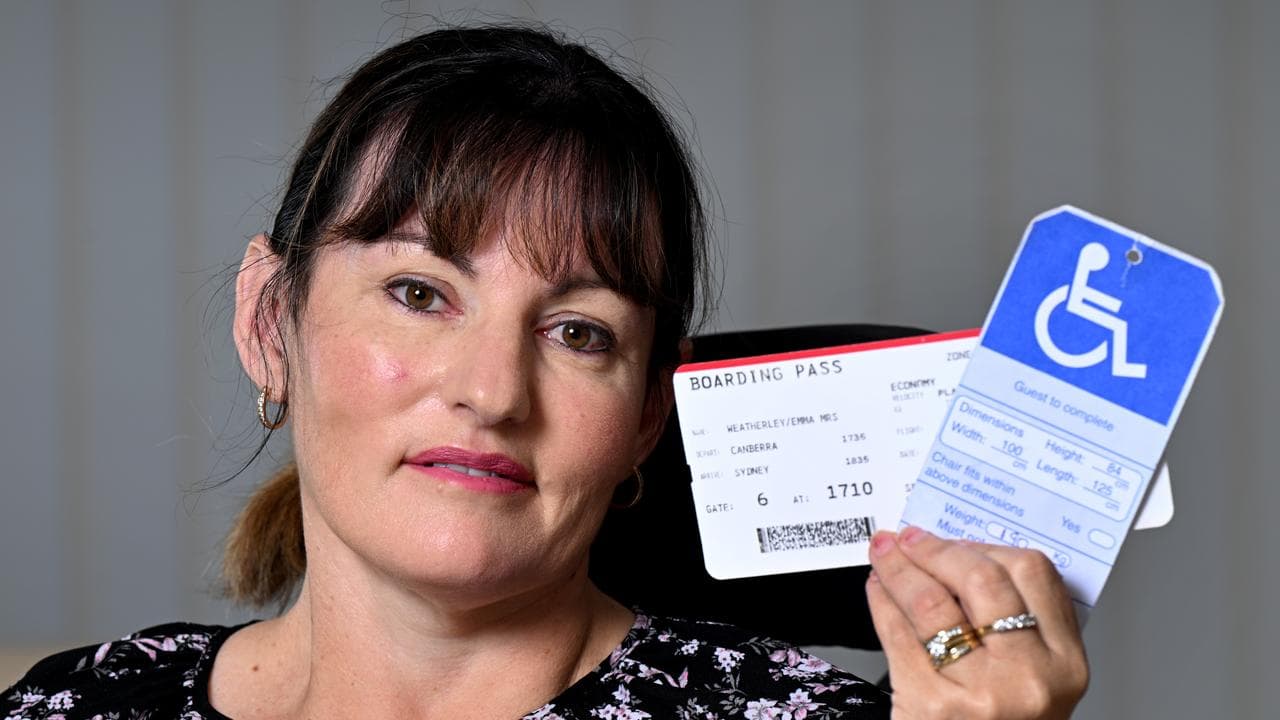 Emma Weatherley with her plane baording ticket