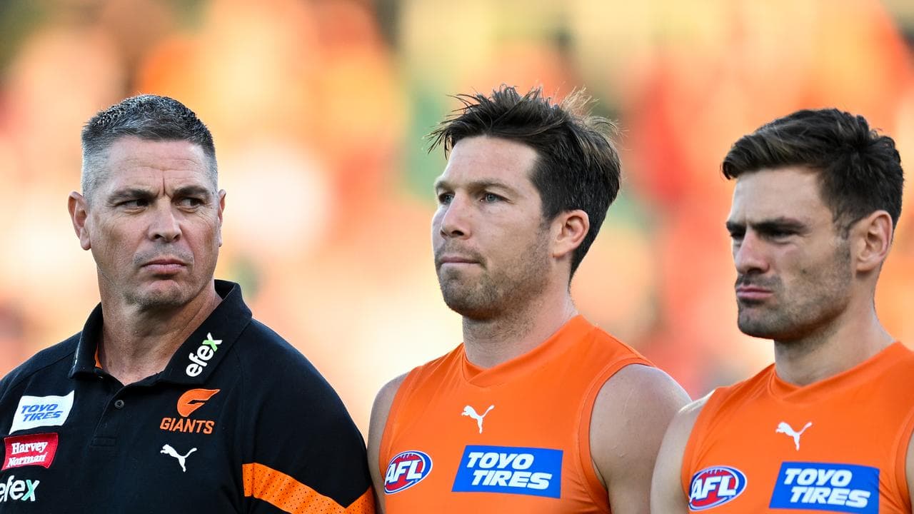 Adam Kingsley with Giants Toby Greene and Stephen Coniglio.