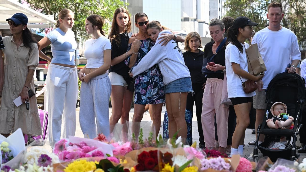 Floral tributes at Bondi Junction.