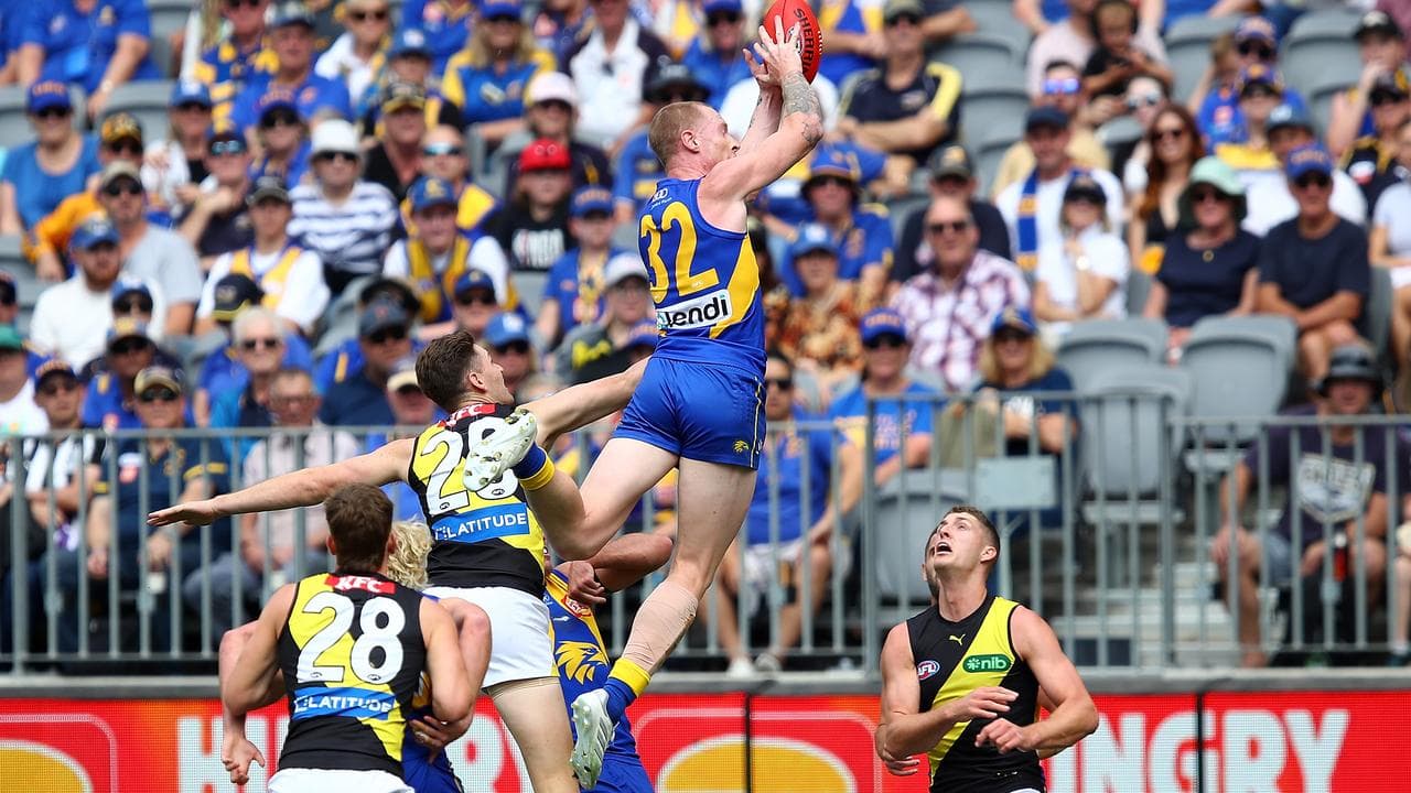 Bailey Williams takes an overhead mark.