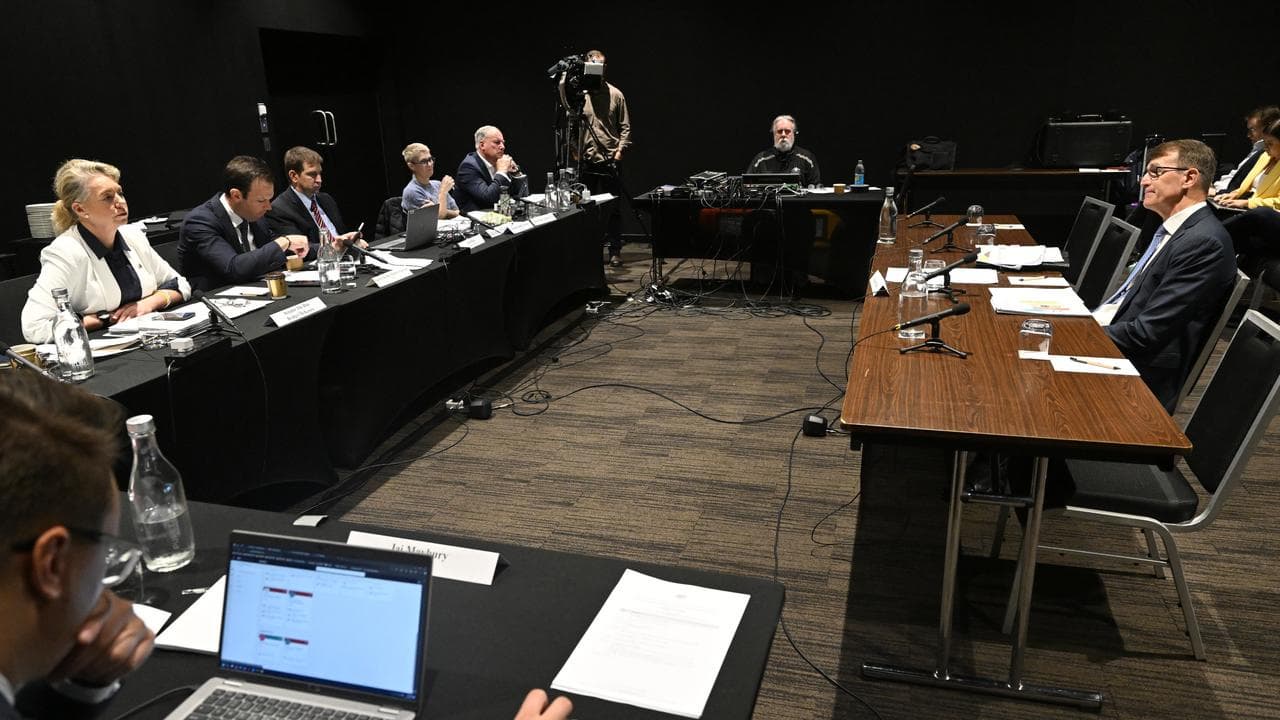 Mr Quirk (right) gives evidence to the Senate committee.