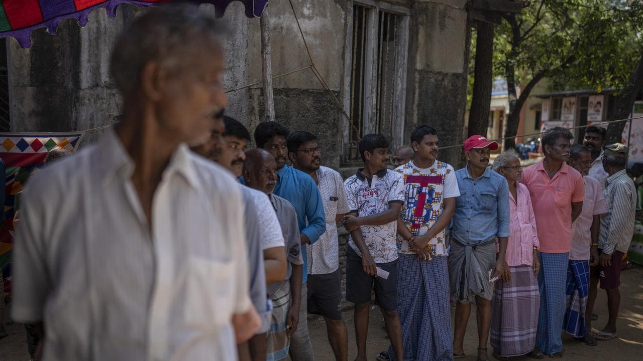 Voters line up in Chennai, southern Tamil Nadu state