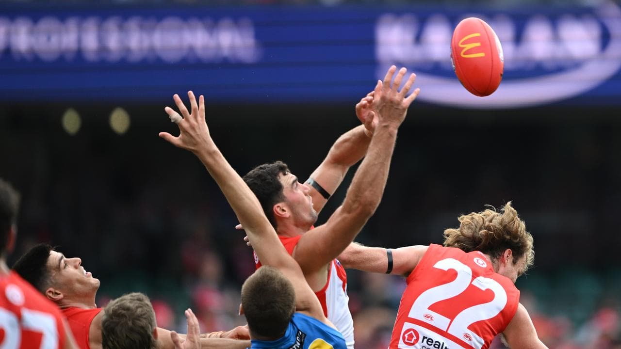 Action from Swans v Suns at SCG.