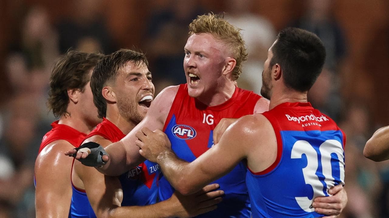 Clayton Oliver celebrates a goal against Port Adelaide. 
