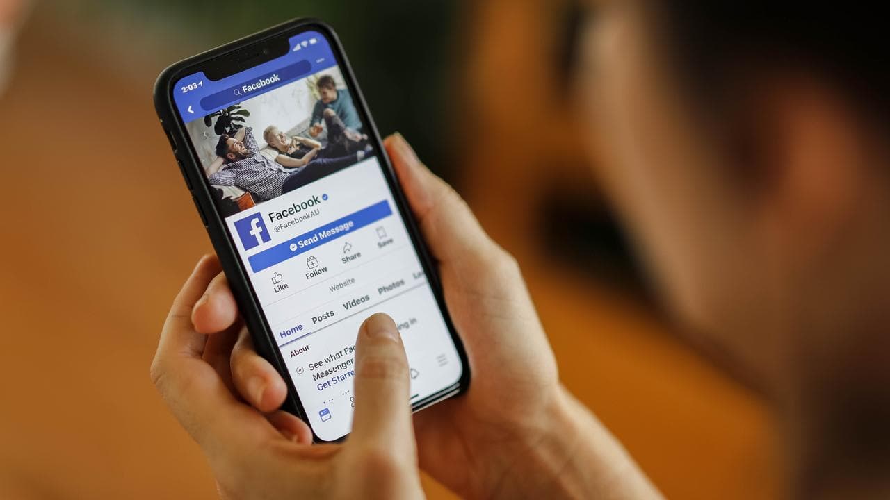 A phone displaying the Facebook app (file image)