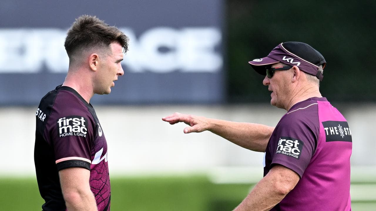 Jock Madden (left) and coach Kevin Walters (right) at Broncos training