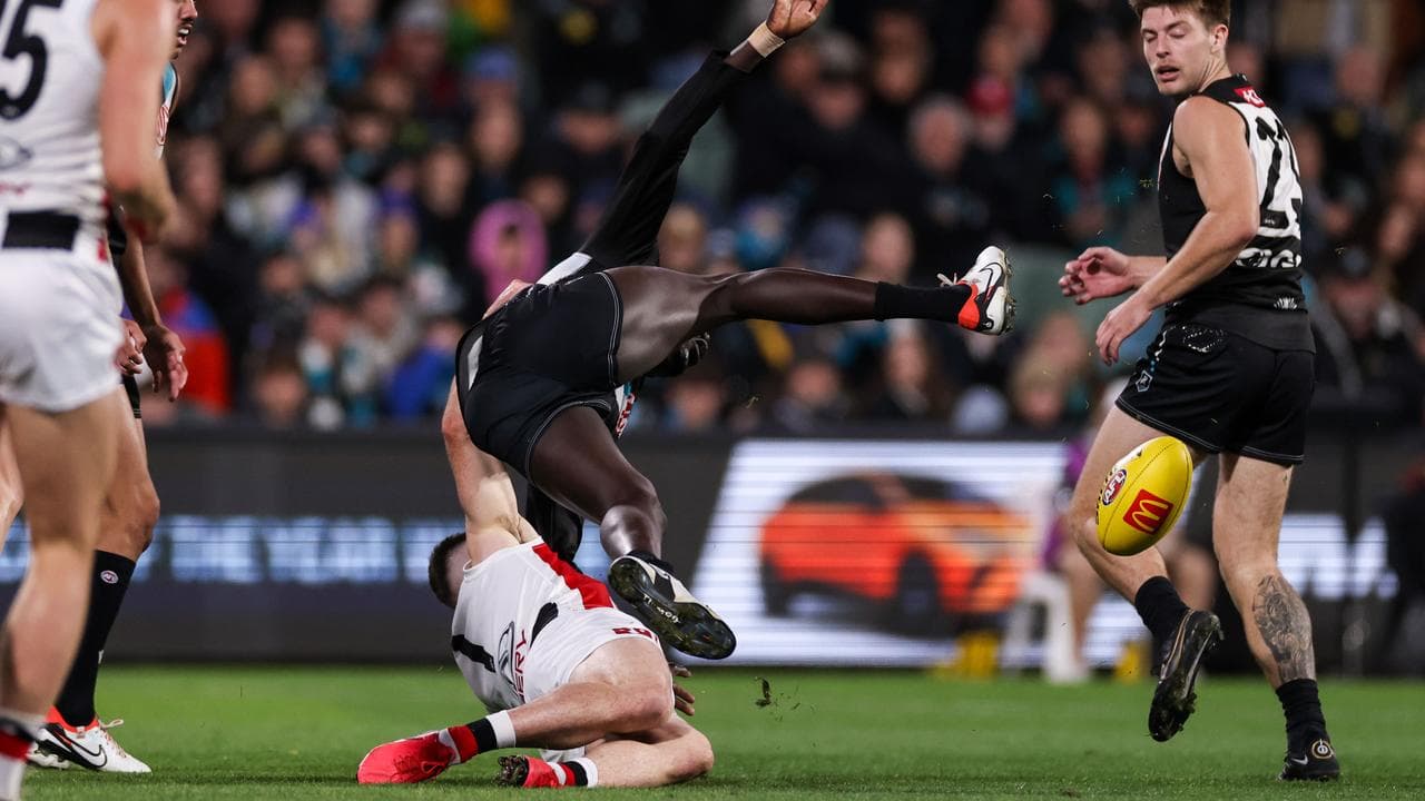 Higgins tackles Aliir Aliir. 