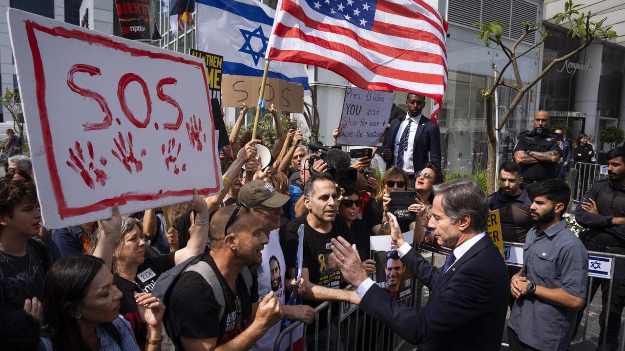 Antony Blinken speaks to demonstrators