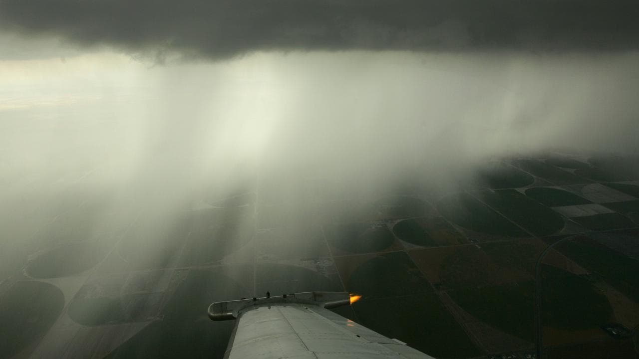 Cloud seeding aeroplane storm rain