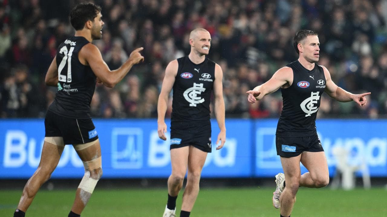 Celebrating Carlton players.